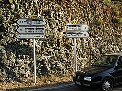 Nationalists in Corsica sometimes spray-paint or shoot traffic signs in French.
