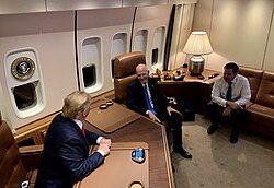 Scott, President Donald Trump, and Senator Marco Rubio aboard Air Force One in 2019
