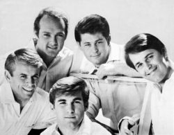 The Beach Boys in 1964; clockwise from top left: Love, Brian, Carl, Dennis, and Al Jardine.