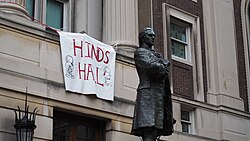 A banner with the name "Hind's Hall" for Hind Rajab, a Palestinian child killed by Israeli forces, and Handala iconography hangs from Hamilton Hall the day after protesters occupied the building.