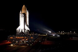 Space Shuttle Atlantis bathed in xenon lights
