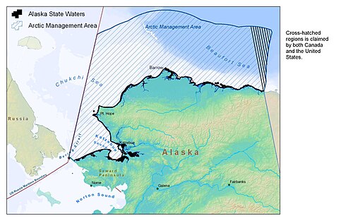 The cross-hatched wedge-shaped region in the east is claimed by both Canada and the US