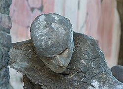 Cast of a victim of the 79 AD Mount Vesuvius eruptions, Pompeii, Italy