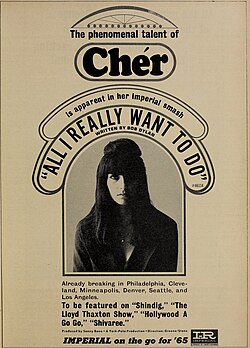 An advertisement features a black-and-white portrait of Cher with long, straight hair and bangs, wearing a dark outfit. The text promotes her "phenomenal talent" and upcoming television appearances.