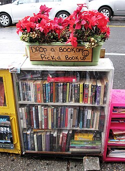 A "street book exchange" in Washington Heights, Manhattan