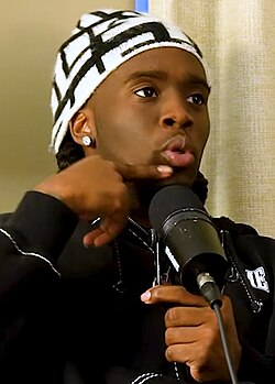 An image of Kai Cenat in an interview