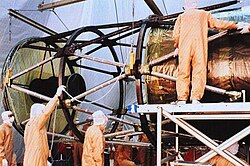 The OTA, metering truss, and secondary baffle are visible in this image of Hubble during early construction.