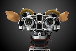 Kismet, a robot head made in the 1990s, is a machine that can recognise and simulate emotions.[68]