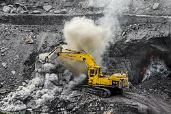 Open-cast mining continues near a fire at Jharia coalfield in India.