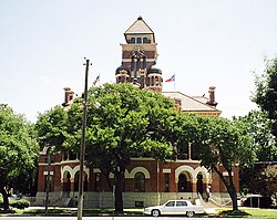 Gonzales County Courthouse, finished in 1896 to plans by J. Gordon Riely, the master of Texas courthouses