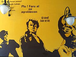 A mural in Warsaw, Poland, referring to Eastwood's Dirty Harry character with a quote in English and Esperanto
