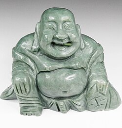 Budai carved from serpentine, height 8 cm (3.1 in)