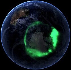 Aurora australis (11 September 2005) as captured by NASA's IMAGE satellite, digitally overlaid onto The Blue Marble composite image. An animation created using the same satellite data is also available.
