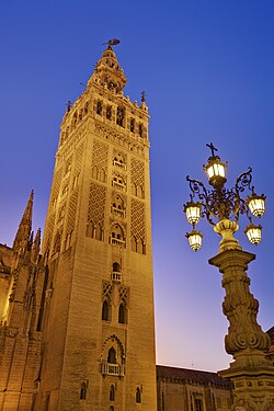 The Giralda of Seville, originally built by the Almohads, is a prime example of Andalusi architecture.