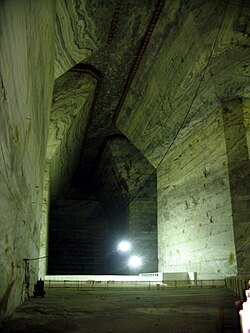Inside Salina Veche, in Slănic, Prahova, Romania. The railing (lower middle) gives an idea of size.