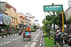 Malioboro street, the main street of Yogyakarta, lined with batik and handicrafts stores on both sides.