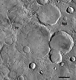Geologic contact of Noachian and Hesperian Systems. Hesperian ridged plains (Hr) embay and overlie older Noachian cratered plains (Npl). Note that the ridged plains partially bury many of the old Noachian-aged craters. Image is THEMIS IR mosaic, based on similar Viking photo shown in Tanaka et al. (1992), Fig. 1a, p. 352.