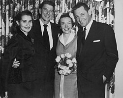 Matron of honor Brenda Marshall and best man William Holden, sole guests at the Reagans' wedding, flank the newlywed couple
