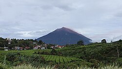 View of Mount Kerinci from the Kayu Aro plateau, Kerinci Regency, Jambi, Indonesia