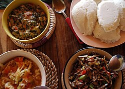 Nsima (top right corner) with three types of relish