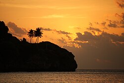 Flying Fish Cove in golden twilight
