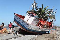 The 2010 tsunami carried this fishing boat ashore.