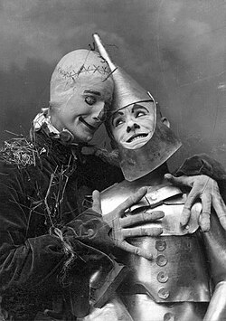 Fred Stone as the Scarecrow (left) and David C. Montgomery as the Tin Woodman in the 1902 stage extravaganza The Wizard of Oz