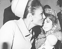 Farah visiting an orphanage in Iran, c. 1968