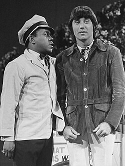 Wilson as Herbie, the ice cream man with an attitude, and guest star Joe Namath, 1972