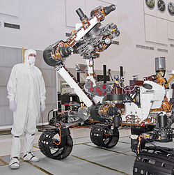 The turret at the end of the robotic arm holds five devices.