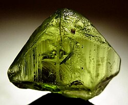 Forsterite olivine, a magnesium iron silicate mineral formed in Earth's upper mantle