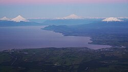 View of Llanquihue Lake. During much of the Llanquihue glaciations glaciers flowing from the Andes in the east (background) coalesced and entered the lake basin forming a large glacier lobe there.