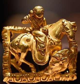 A horserider of probable Xiongnu origin: the rider wears a hairbun characteristic of the oriental steppes, and his horse has characteristically Xiongnu horse trappings.[148] 2nd–1st century BC. Excavated in Saksanokhur (near Farkhor), Tajikistan. National Museum of Antiquities of Tajikistan.
