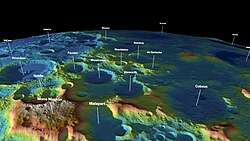 A lunar south pole terrain in coded color. Several permanently shadowed craters are shown: Shackleton, Shoemaker, Cabeus