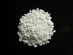 Sample of calcium chloride, showing its tendency to cake.