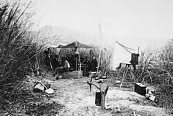 First camp of the John Wesley Powell expedition [second Colorado River expedition], in the willows, Green River, Wyoming, 1871.