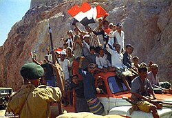NLF supporters waving their flags as part of the celebrations and mass marches on 29 and 30 November 1967