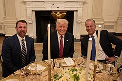 Mullin (left) with president Donald Trump (center) and Senate majority leader John Thune (right) in July 2025