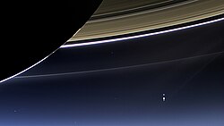 NASA's Cassini spacecraft photographs The Day the Earth Smiled shows the Earth and Moon (bottom-right) from Saturn (July 19, 2013)