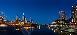 Melbourne is the largest settlement that the Yarra flows through. The Yarra at central Melbourne is shown here at night, with the central business district on the left and Southbank on the right