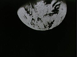 Earth seen during the Apollo 8 live TV transmission on 23 December 1968 using the 100 mm telephoto lens on the RCA command module TV camera