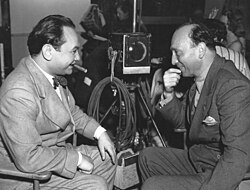 Edward G. Robinson (l) with Curtiz, during filming of Kid Galahad (1937)
