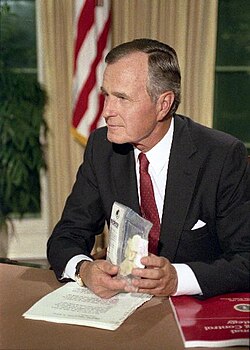 President George H. W. Bush holds up a bag of crack cocaine during his Address to the Nation on National Drug Control Strategy on 5 September 1989.