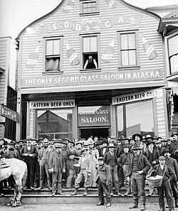 Photographed in 1901, Wyatt Earp billed his Dexter Saloon in Nome as "the only second class saloon in Alaska".