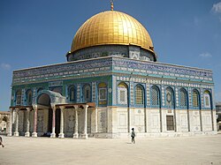 Dome of the Rock, built during the reign of Abdul Malik. Anachronistically associated[j] with the Isra and Miraj, it is believed to be the specific place where the Prophet Muhammad have ascended to heaven.[157]
