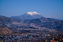 The city of La Paz reaches up to 4,000 metres (13,000 ft) in elevation. Mount Illimani dominates the city's skyline.