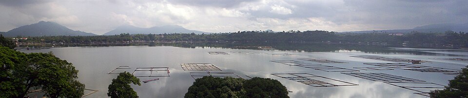 Sampaloc Lake maar with (from L to R) Mounts Lagula, Nagcarlan and Atimba in the background. The slope to the right is the base of Mount Banahaw.