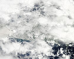 Signs of the eruption at Mount Merapi managed to puncture the persistent cloud cover over Java on 5 November 2010 when this natural-colour image was captured.