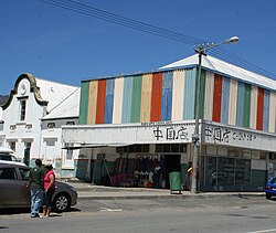 A "China shop" in Porterville, Western Cape, South Africa in 2010. Since the early 2000s many such shops, usually general dealers, have opened up in rural areas by Chinese immigrants from mainland China.