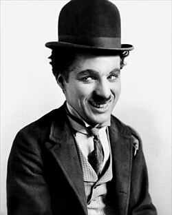 Chaplin in costume as The Tramp